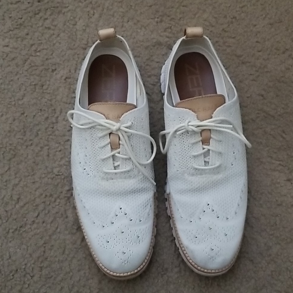 Cole Haan stitched light winged-tip white shoes